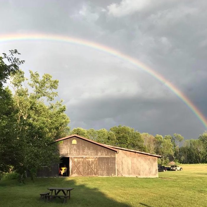 art camp barn and rainbow
